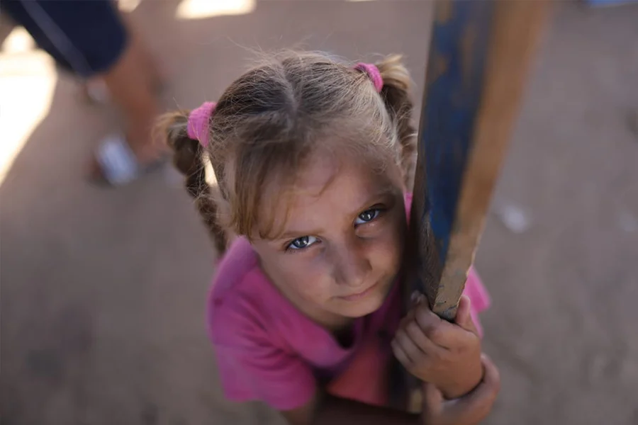 Palestinian child looking up